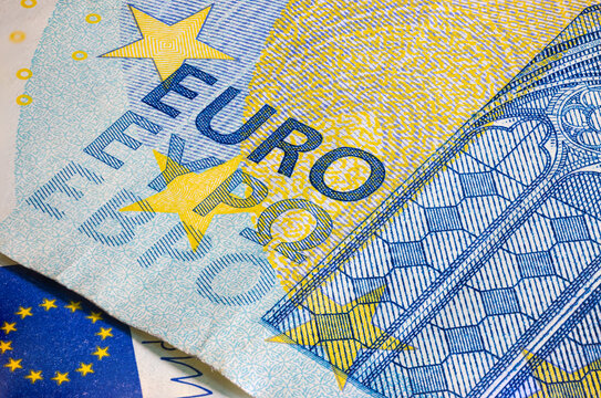 Macro photography of the intaglio print on a twenty euro banknote, high resolution capture. Sharp detailed shot of the euro character on the ecb 20 euros notes. Currency of Europe 