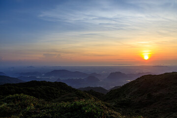 sunrises over the mountains