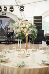 Luxury, elegant wedding reception table arrangement, floral centerpiece