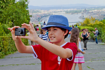 happy boy take a picture  in Budapest Hungary