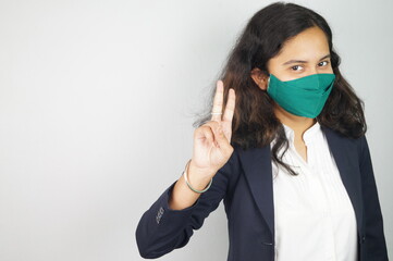 Girl Wearing Mask In Office , corona warriors , face mask , using sanitizer images .