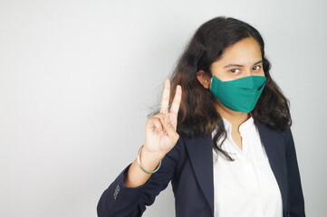 Girl Wearing Mask In Office , corona warriors , face mask , using sanitizer images .
