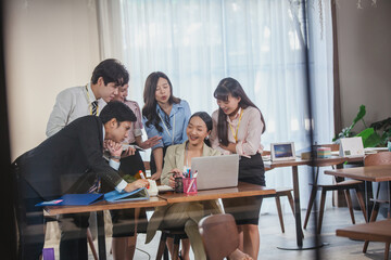 Obraz na płótnie Canvas business team Asian congratulating Colleague, Marketing Analysis Accounting Team Teamwork Business Meeting Concept.