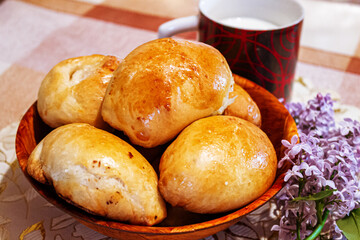 Homemade pastries. Delicious close-up pies and a glass of milk.