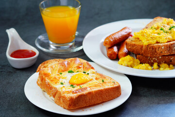 Homemade Breakfast With fried egg, bacon, toast and juiceHomemad