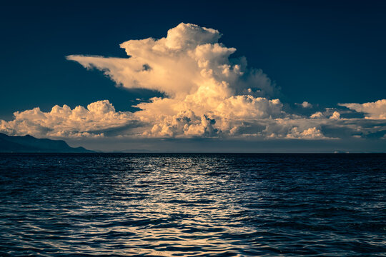Dramatic Landscape of Cumulonimbus or Thunderous Clouds above The Sea or Ocean in Summer, Stormy Cloud, Seto Inland Sea in Kagawa Prefecture in Japan, Natural Image, Nobody	