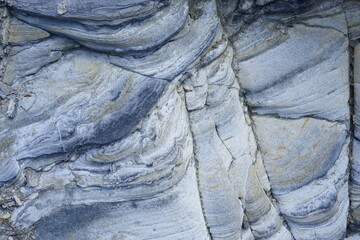 Rock layers, formations of rocks stacked over the hundreds of years. Background with fascinating...