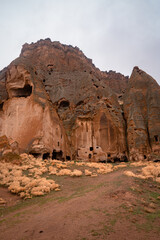 Obraz premium Vertical view of the ancient Selime Monastery in Cappadocia, Turkey on a moody day