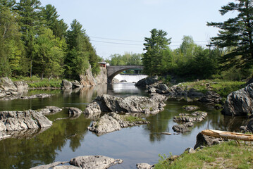 Fototapeta na wymiar Waterfall and bridge on the Missisquoi River in Vermont