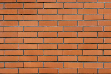 Orange brick wall texture. Brick wall background with space for text. 