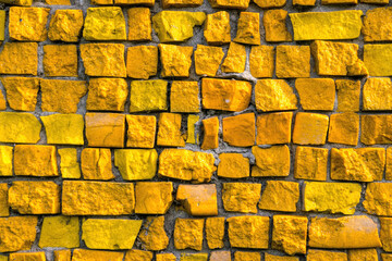 Texture of old yellow ceramic mosaic	