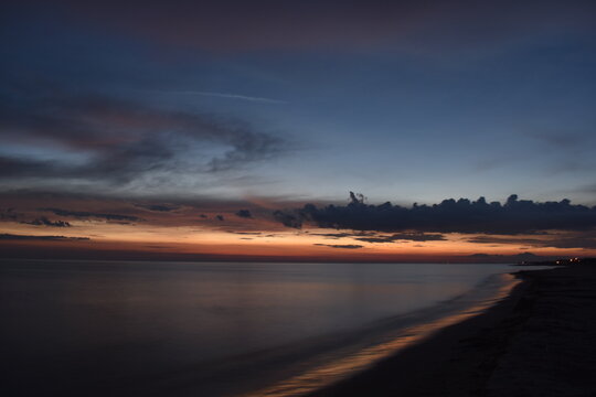 Beautiful sunset over calm sea Liepaja Latvia