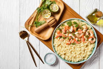 Lime shrimps with cilantro and rice, top view