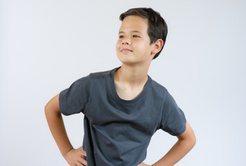 Beautiful young boy very cool and confident isolated over white background