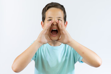screaming teenage boy isolated on a white background