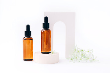 Natural cosmetic skincare bottle containers on light background. Natural beauty