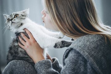 Young beautiful woman with cat. High quality photo - 435045902