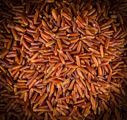 close up texture of raw brown rice. Background.