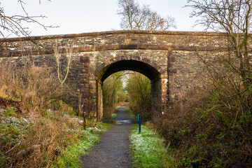 Fototapeta na wymiar Road bridge over the old Paddy Line or Galloway railway line , scotland