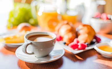 Breakfast served with coffee, orange juice, croissants, cereals