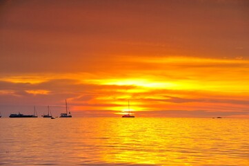 Naklejka na ściany i meble Sunset on the beach at Lipe Island , Satun Thailand