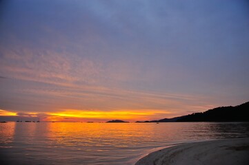 Sunset on the beach at Lipe Island , Satun Thailand