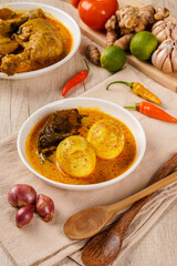 Gulai telur or eggs serve with curry sauce, Gulai Telur is traditional food of Indonesia from Padang, West Sumatera.
