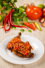 Fried Chicken with Sambal Balado. Fried Chicken with Sambal Balado is Traditional food from Padang, West Sumatra