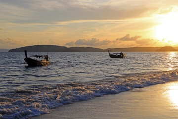 Ao Nang, Thailand. Sunset on the beautiful beach of the village.