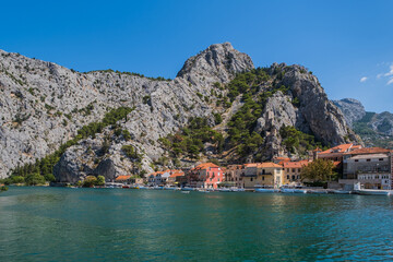 Scenic view at coastal town Omis, picturesque summer touristic place on Adriatic Sea in Croatia, August 2020