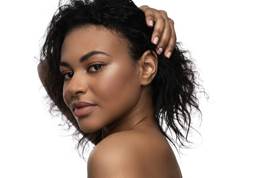 Beautiful black woman with smooth skin on white background