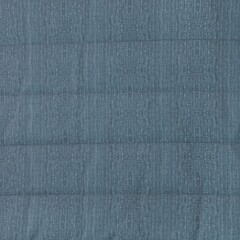 Fototapeta na wymiar Blue Quilted Bedspread Fabric Texture