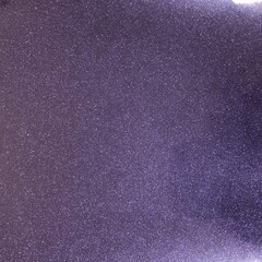 Foil material texture in purple with glitter