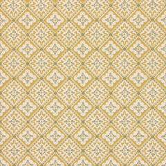 Vintage wallpaper texture with a yellow and green diamond shaped floral pattern