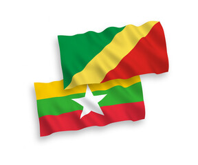 National vector fabric wave flags of Republic of the Congo and Myanmar isolated on white background. 1 to 2 proportion.
