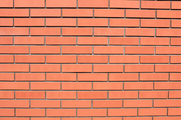 Textured red brick background with copy space