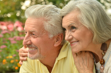 portrait of beautiful caucasian senior couple  in the park
