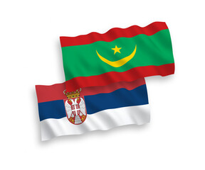 National vector fabric wave flags of Islamic Republic of Mauritania and Serbia isolated on white background. 1 to 2 proportion.