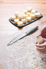 The chef prepares the dough