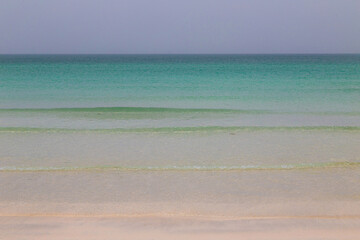 Obraz premium Beach. Blue sea and white sand. Summer time. Seacost