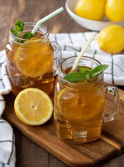 Two Glasses of Iced Tea With Lemon Slices