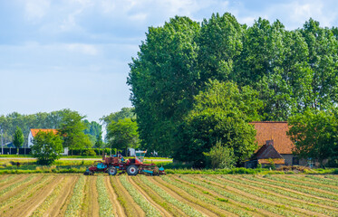 typical dutch countryside scenery, Machine at farmland, Waterlandkerkje, Zeeland, the Netherlands