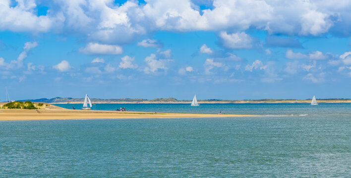beautiful view on the ocean with ships sailing, Breskens beach, zeeland, The Netherlands