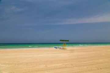 Obraz premium Beach. Blue sea and white sand. Summer time. Seacost