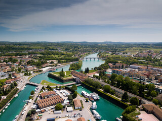 Obraz premium Italy, May 202: aerial view of the city of Peschiera del Garda in the province of Verona in Veneto.