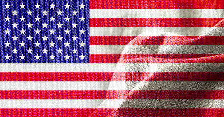 Naklejka premium USA flag in the fabric textile textured background
