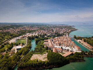 Fototapeta na wymiar Italy, May 202: aerial view of the city of Peschiera del Garda in the province of Verona in Veneto.