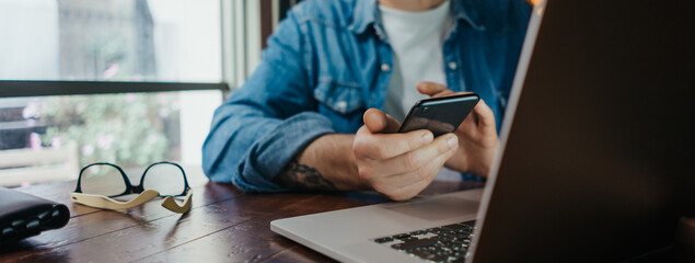 Man pointing on smartphone screen, chatting in social networks, meeting website, searching...