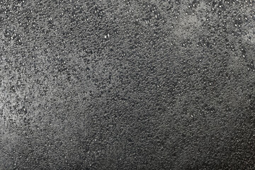 Metallic background or strange metal surface structure with clear water drops texture. High resolution macro close-up for your design.