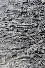 Cooled lava flows, smooth ropy surface, nature texture, background, Volcanoes National Park, Big island, Hawaii